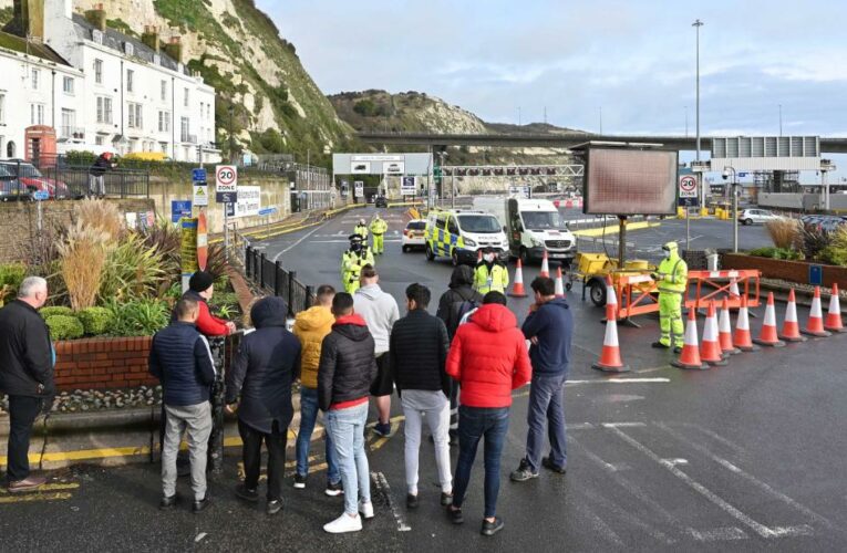 Trucks pile up in England as UK and France hold crisis talks to reopen border