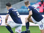 Millwall fans BOO after players take the knee ahead of Championship clash with Derby
