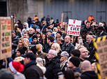 Hundreds of anti-lockdown campaigners take to the streets of Manchester for peaceful protest