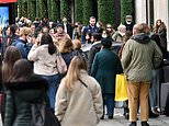 Primark fans queue overnight as Christmas shoppers prepare to blow £1.7billion today