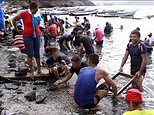 Mystery as hundreds of precious jewellery items wash up on beach in poor Venezuelan fishing village