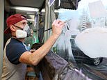 There’s no business like SNOW business! Village shops decorate their windows with wintry scenes