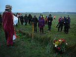 Britain welcomes the Winter Solstice: Pagan revellers gather at a closed Stonehenge on shortest day