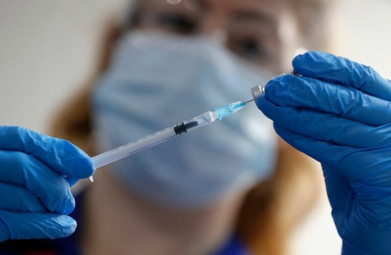 UK investigates possible allergic reactions to COVID-19 shot