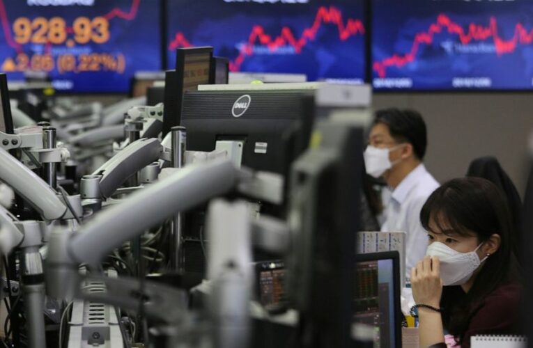 Asian shares extend gains after more Wall Street records