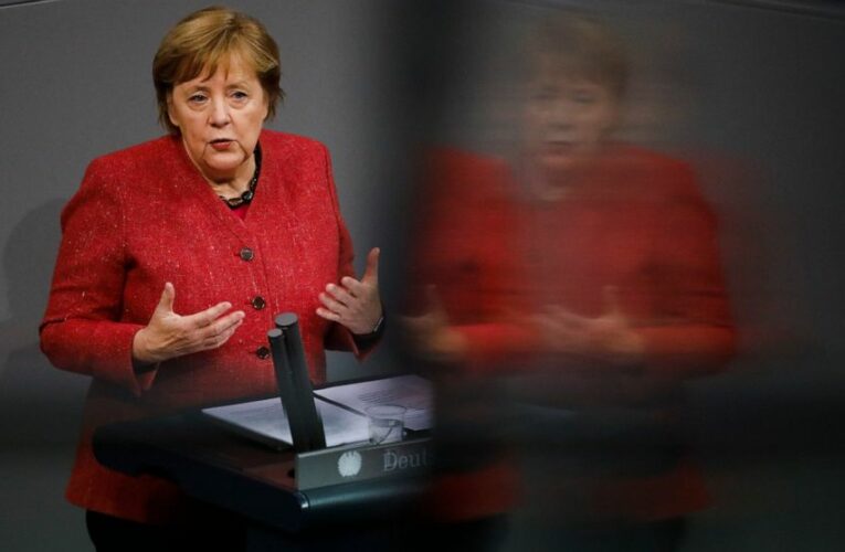 Merkel backs tougher virus curbs as German deaths hit record