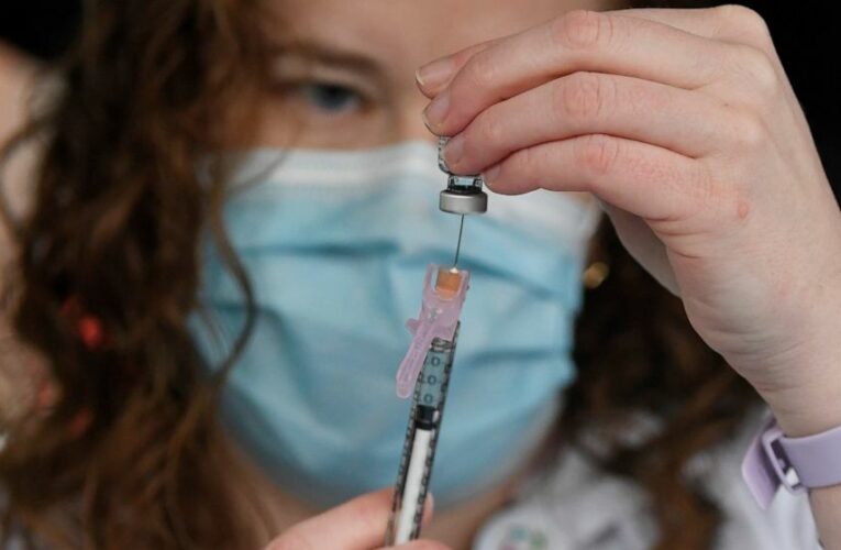 ‘Relieved’: US health workers start getting COVID-19 vaccine