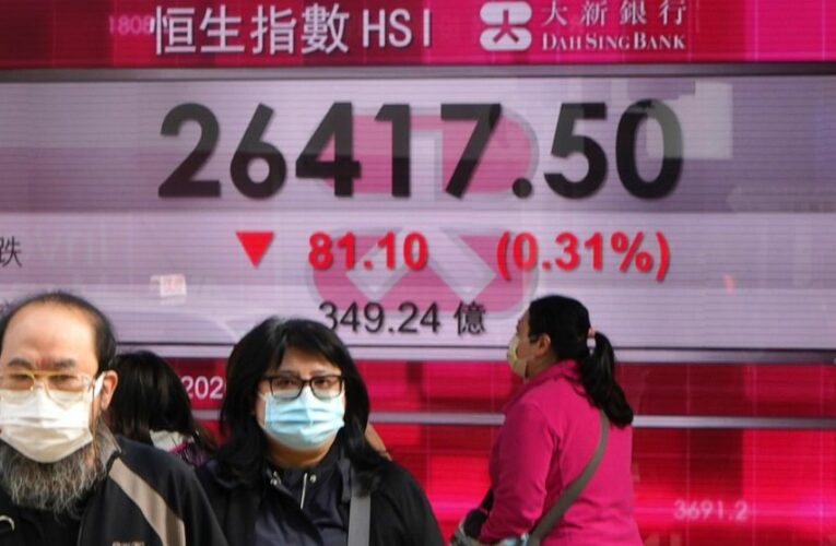 Stocks fall on worries about virus’ spread, but pare losses