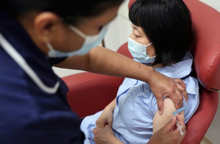 UK gears up for huge vaccination plan watched by the world