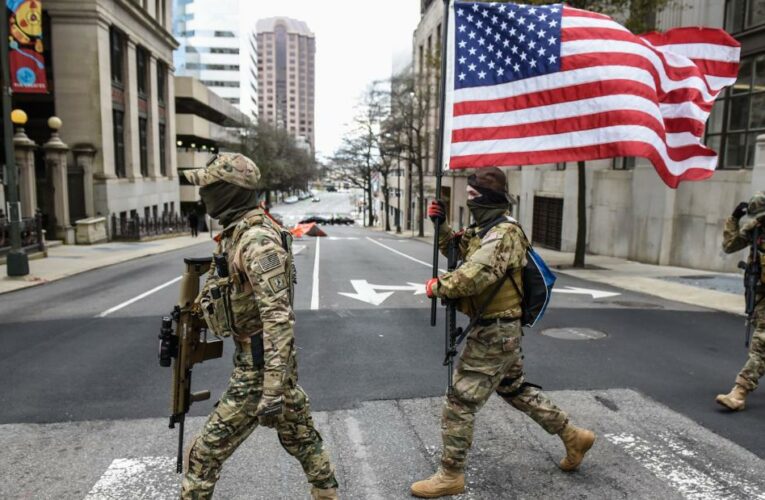 Armed demonstrators gather at Virginia state Capitol as states stay tight on security ahead of inauguration