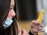 Pupils are forced to perform their OWN Covid tests at school as nurse watches on