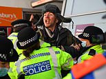 Covid clash on Clapham Common: Police confront anti-lockdown mob chanting ‘take your freedom back’
