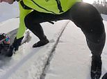 ICE try, lads! Moment daredevil biker trying to cross frozen lake plunges into water