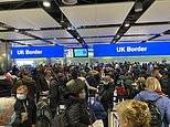 Huge crowds wait at Heathrow border control as travellers stream back into the UK