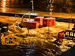 Dramatic moment town’s flood defences are breached after month’s worth of rain in less than 48 hours