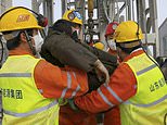 Nine Chinese gold miners trapped 2,000 feet underground are rescued