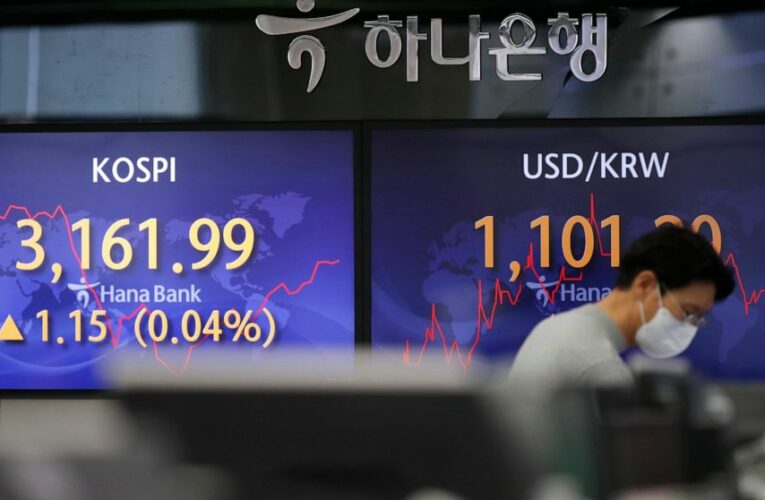 Global stocks sink after China coronavirus resurgence