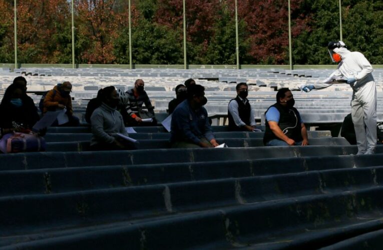 The Latest: Fauci says vaccine goal would cover 67 million