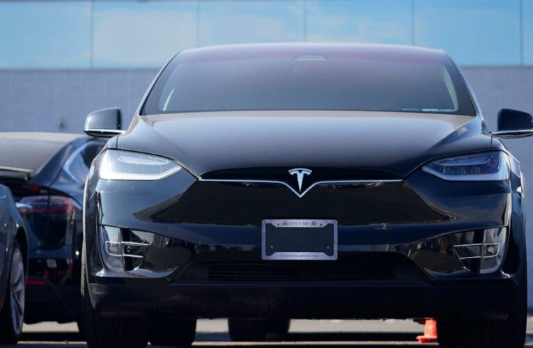 Tesla posts 1st annual profit but misses analysts’ estimates