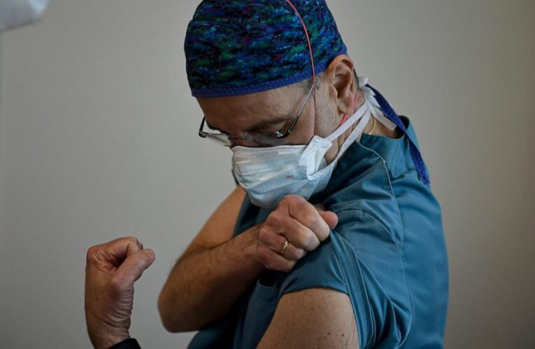 The Latest: China restricts travel for busy Lunar New Year