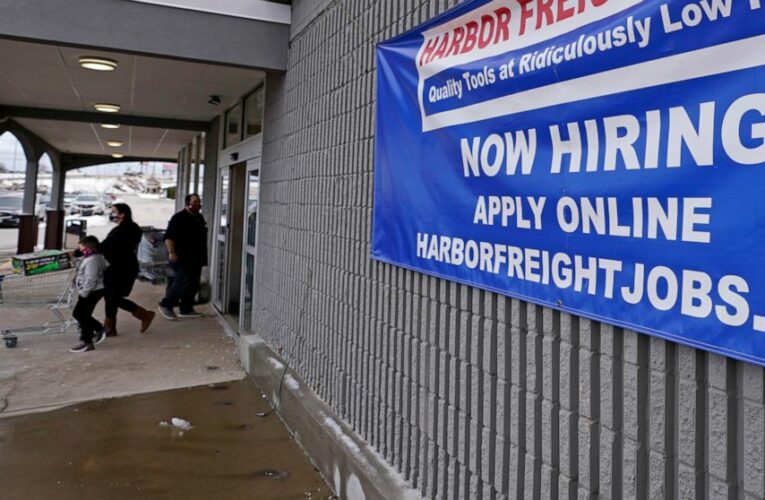 US jobless claims decline to a still-high 900,000