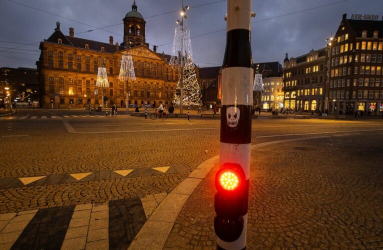 Dutch lawmakers back coronavirus curfew despite criticism