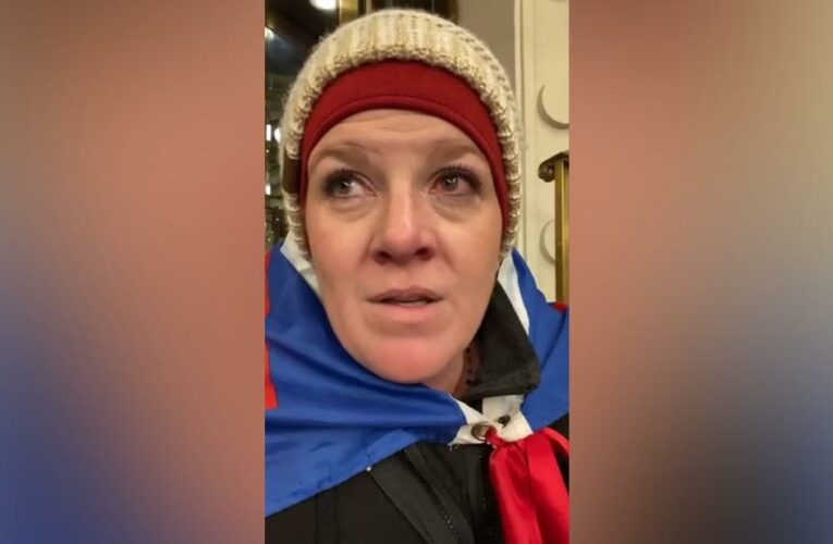 Woman charged in riot asks judge to let her take vacation