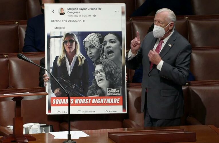 Hoyer walks photo of Greene’s AR-15 post across House floor