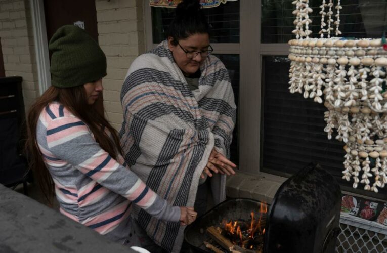 Millions endure a deadly storm without power. Ice and low temperatures are forecast for worst-hit states.