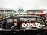 Funeral for one of Britain’s oldest identical twins stops off at her favourite supermarket Asda