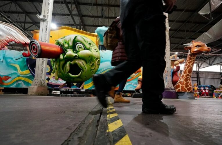 Virus-muffled Mardi Gras hits New Orleans’ party-loving soul