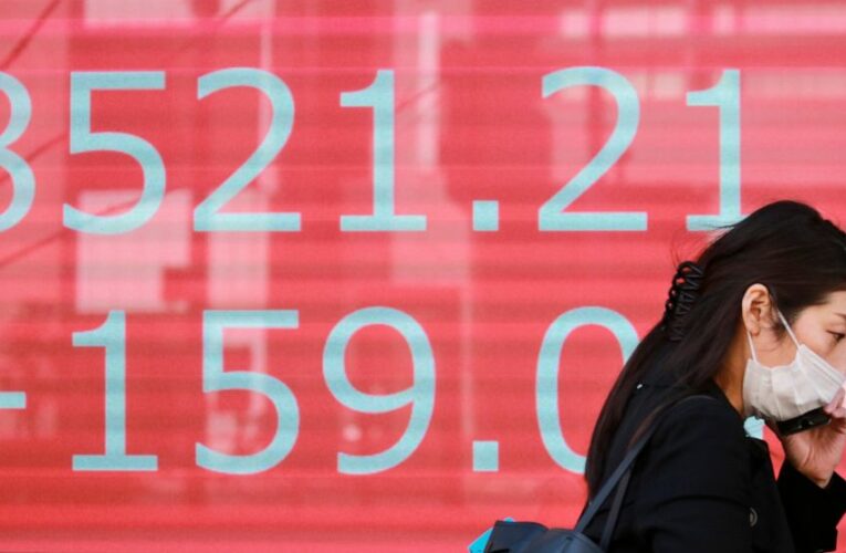 Asian shares down on caution after modest US gains