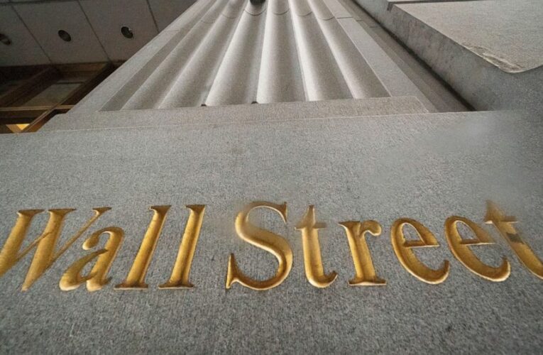 Asian stocks higher after Wall St. rises to new record