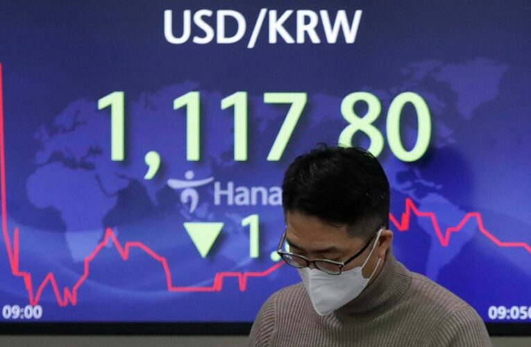 Asian stocks higher after Wall Street rises to new record