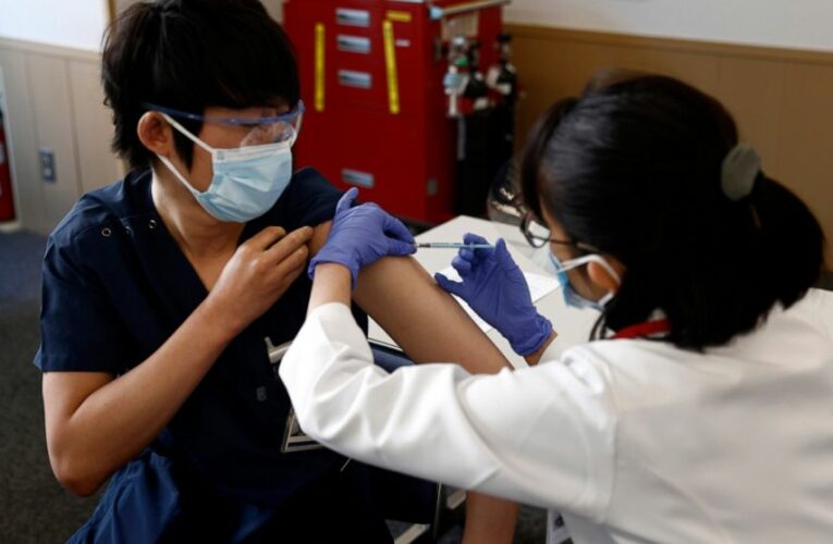 Japan starts COVID-19 vaccinations with eye on Olympics