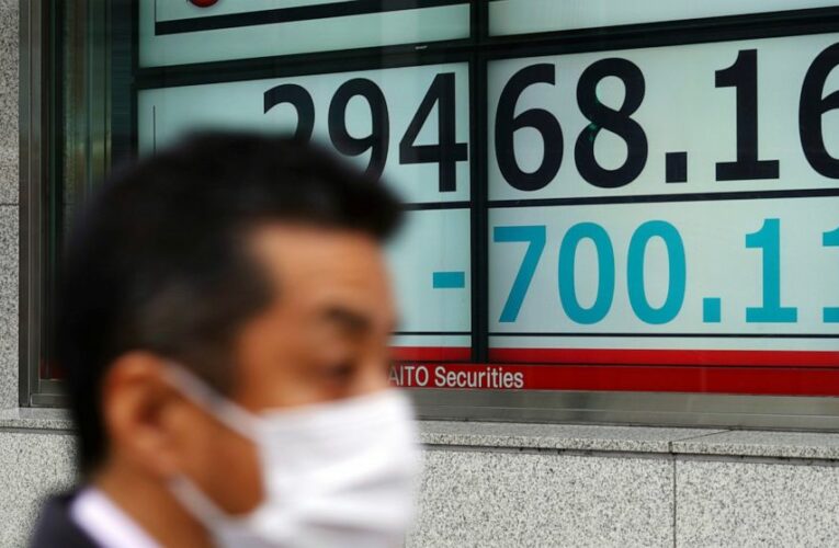 A bumpy day leaves stocks mostly lower; bond yields ease