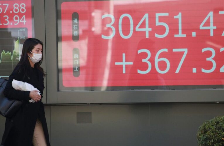 Stocks end wobbly day mostly lower; natural gas prices surge