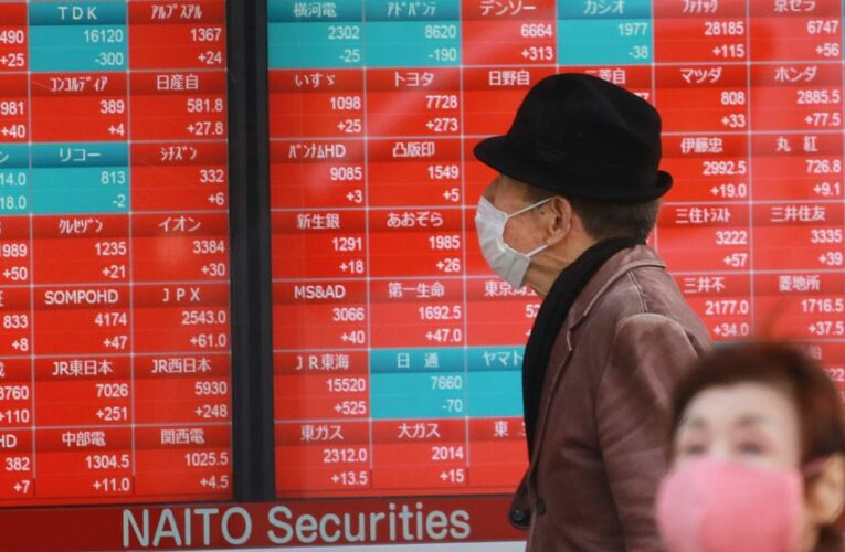 Asian shares mostly higher, China markets fall back