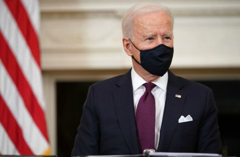 With relief in sight, Biden asks for faith in US democracy
