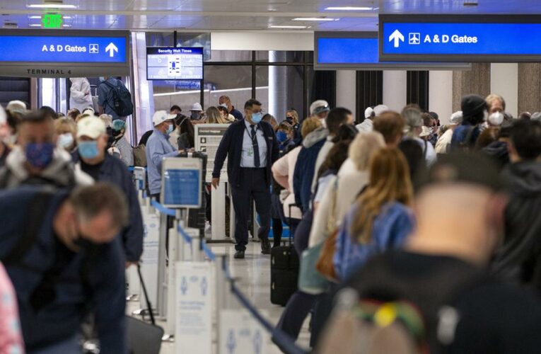 Air travel reaches a pandemic-era record despite concerns over a coronavirus variant