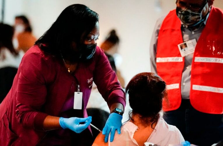 Record Covid-19 vaccinations don’t mean it’s time to relax, officials say