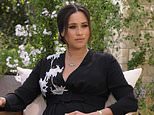 Pregnant Meghan Markle cradles her baby bump in trailer for Oprah interview