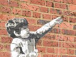 Has Banksy been busy again? Mural of kite-flying child appears on brick wall in Winchester