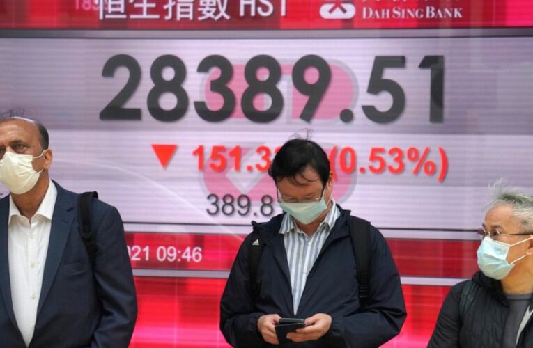Asian shares trade mixed on recovery hopes, yield worries