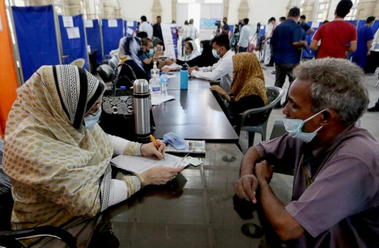 The Latest: AP source: US to buy additional 100M J&J doses