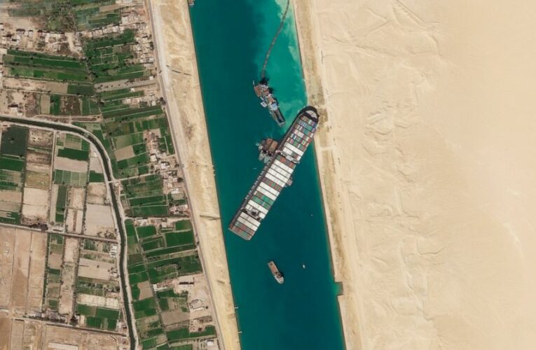 Container ship stuck in Suez Canal ‘partially refloated’