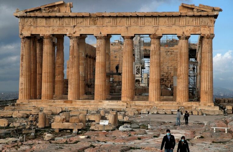 The Latest: Lebanon reopens restaurants with precautions