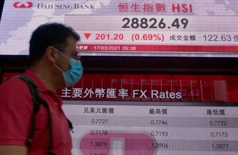 Wall Street closes lower, pulled down by IT and energy