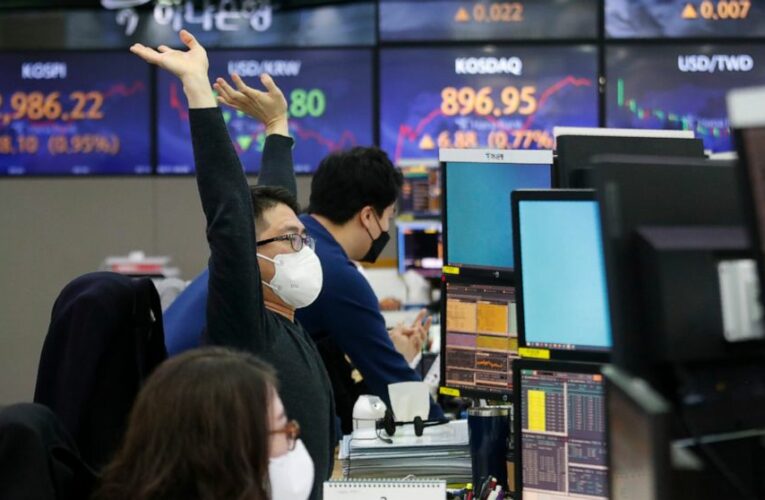 More records for stock indexes as stimulus bill becomes law