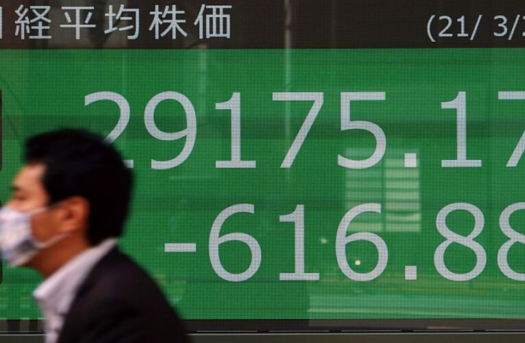 Tech leads stocks higher as bond yields ease; banks fall
